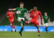 27 March 2021; James Collins of Republic of Ireland in action against Marvin Martins of Luxembourg during the FIFA World Cup 2022 qualifying group A match between Republic of Ireland and Luxembourg at the Aviva Stadium in Dublin. Photo by Harry Murphy/Sportsfile