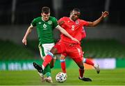 27 March 2021; Jason Knight of Republic of Ireland in action against Christopher Martins of Luxembourg during the FIFA World Cup 2022 qualifying group A match between Republic of Ireland and Luxembourg at the Aviva Stadium in Dublin. Photo by Eóin Noonan/Sportsfile