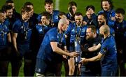 27 March 2021; Leinster player, from left, Devin Toner, Michael Bent and Scott Fardy prepare to lift the PRO14 trophy after the Guinness PRO14 Final match between Leinster and Munster at the RDS Arena in Dublin. Photo by Brendan Moran/Sportsfile