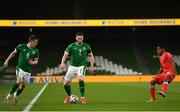 27 March 2021; Matt Doherty of Republic of Ireland, centre, supported by team-mate Jason Knight, left, in action against Leandro Barreiro of Luxembourg during the FIFA World Cup 2022 qualifying group A match between Republic of Ireland and Luxembourg at the Aviva Stadium in Dublin. Photo by Seb Daly/Sportsfile