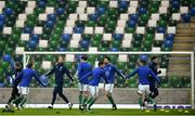28 March 2021; The Northern Ireland team warm-up prior to the International friendly match between Northern Ireland and USA at National Football Stadium at Windsor Park in Belfast. Photo by David Fitzgerald/Sportsfile