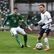 28 March 2021; Sergiño Dest of USA in action against Kyle Lafferty of Northern Ireland during the International friendly match between Northern Ireland and USA at the National Football Stadium at Windsor Park in Belfast. Photo by David Fitzgerald/Sportsfile