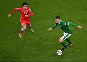 27 March 2021; Ciaran Clark of Republic of Ireland in action against Olivier Thill of Luxembourg during the FIFA World Cup 2022 qualifying group A match between Republic of Ireland and Luxembourg at the Aviva Stadium in Dublin. Photo by Piaras Ó Mídheach/Sportsfile