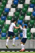 28 March 2021; Giovanni Reyna of USA celebrates with Sergiño Dest, right, after scoring his side's first goal during the International friendly match between Northern Ireland and USA at the National Football Stadium at Windsor Park in Belfast. Photo by David Fitzgerald/Sportsfile