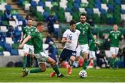 28 March 2021; Christian Pulišic of USA is fouled by Daniel Ballard of Northern Ireland, resulting in a penalty, during the International friendly match between Northern Ireland and USA at the National Football Stadium at Windsor Park in Belfast. Photo by David Fitzgerald/Sportsfile
