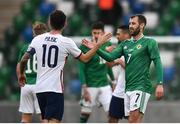 28 March 2021; Niall McGinn of Northern Ireland and Christian Pulišic of USA following the International friendly match between Northern Ireland and USA at the National Football Stadium at Windsor Park in Belfast. Photo by David Fitzgerald/Sportsfile