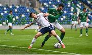 28 March 2021; Brenden Aaronson of USA in action against Conor McLaughlin of Northern Ireland during the International friendly match between Northern Ireland and USA at National Football Stadium at Windsor Park in Belfast. Photo by David Fitzgerald/Sportsfile