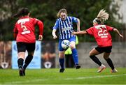 27 March 2021; Gillian Keenan of Treaty United in action against Chloe Flynn, right, and Isobel Finnegan of Bohemians during the SSE Airtricity Women's National League match between Bohemians and Treaty United at Oscar Traynor Centre in Coolock, Dublin. Photo by Piaras Ó Mídheach/Sportsfile