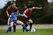 27 March 2021; Abbie Brophy of Bohemians, supported by teammate Chloe Darby, left, in action against Alana Roddy of Treaty United during the SSE Airtricity Women's National League match between Bohemians and Treaty United at Oscar Traynor Centre in Coolock, Dublin. Photo by Piaras Ó Mídheach/Sportsfile