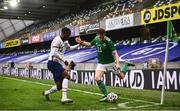 28 March 2021; Shane Ferguson of Northern Ireland in action against Kellyn Acosta of USA during the International friendly match between Northern Ireland and USA at National Football Stadium at Windsor Park in Belfast. Photo by David Fitzgerald/Sportsfile