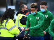 29 March 2021; Callum Robinson has hand sanitiser sprayed on his hand upon arrival for a Republic of Ireland training session at the Debrecen Football Academy in Debrecen, Hungary. Photo by Stephen McCarthy/Sportsfile