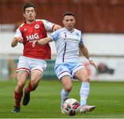 27 March 2021; Chris Lyons of Drogheda United in action against Lee Desmond of St Patrick's Athletic during the SSE Airtricity League Premier Division match between St Patrick's Athletic and Drogheda United at Richmond Park in Dublin. Photo by Matt Browne/Sportsfile