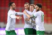 30 March 2021; James McClean of Republic of Ireland celebrates after scoring his side's first goal with team-mates, from left, Shane Duffy, Jeff Hendrick and Robbie Brady during the international friendly match between Qatar and Republic of Ireland at Nagyerdei Stadion in Debrecen, Hungary. Photo by Stephen McCarthy/Sportsfile