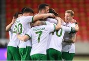 30 March 2021; James McClean, right, celebrates after scoring his side's first goal with his Republic of Ireland team-mates during the international friendly match between Qatar and Republic of Ireland at Nagyerdei Stadion in Debrecen, Hungary. Photo by Stephen McCarthy/Sportsfile