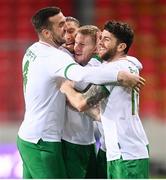 30 March 2021; James McClean of Republic of Ireland celebrates after scoring his side's first goal with team-mates, from left, Shane Duffy, Jeff Hendrick and Robbie Brady during the international friendly match between Qatar and Republic of Ireland at Nagyerdei Stadion in Debrecen, Hungary. Photo by Stephen McCarthy/Sportsfile