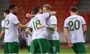 30 March 2021; James McClean, right, with Republic of Ireland team-mates, including Shane Long, 18, after scoring his side's first goal during the international friendly match between Qatar and Republic of Ireland at Nagyerdei Stadion in Debrecen, Hungary. Photo by Stephen McCarthy/Sportsfile