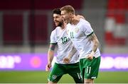 30 March 2021; Republic of Ireland's James McClean, right, celebrates with team-mate Robbie Brady after scoring his side's goal during the international friendly match between Qatar and Republic of Ireland at Nagyerdei Stadion in Debrecen, Hungary. Photo by Stephen McCarthy/Sportsfile