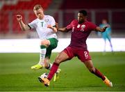 30 March 2021; Daryl Horgan of Republic of Ireland in action against Pedro Miguel of Qatar during the international friendly match between Qatar and Republic of Ireland at Nagyerdei Stadion in Debrecen, Hungary. Photo by Stephen McCarthy/Sportsfile