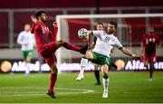 30 March 2021; Tarek Salman of Qatar in action against Shane Long of Republic of Ireland during the international friendly match between Qatar and Republic of Ireland at Nagyerdei Stadion in Debrecen, Hungary. Photo by Stephen McCarthy/Sportsfile