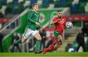 31 March 2021; George Saville of Northern Ireland in action against Georgi Yomov of Bulgaria during the FIFA World Cup 2022 qualifying group C match between Northern Ireland and Bulgaria at the National Football Stadium in Windsor Park, Belfast. Photo by David Fitzgerald/Sportsfile