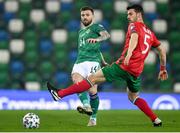 31 March 2021; Stuart Dallas of Northern Ireland in action against Petar Vitanov of Bulgaria during the FIFA World Cup 2022 qualifying group C match between Northern Ireland and Bulgaria at the National Football Stadium in Windsor Park, Belfast. Photo by David Fitzgerald/Sportsfile