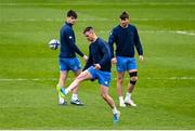 1 April 2021; Jonathan Sexton, centre, watched by Harry Byrne, left, and Ross Byrne during the Leinster Rugby captains run at the RDS Arena in Dublin. Photo by Ramsey Cardy/Sportsfile