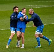 1 April 2021; Jordan Larmour is tackled by Jack Conan, left, and Rhys Ruddock during the Leinster Rugby captains run at the RDS Arena in Dublin. Photo by Ramsey Cardy/Sportsfile