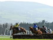 1 April 2021; Cavallino, left, with Conor McNamara up, jumps the fifth during the Happy Easter To All Our Patrons Opportunity Maiden Hurdle at Clonmel Racecourse in Tipperary. Photo by Harry Murphy/Sportsfile