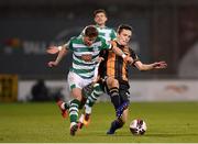 2 April 2021; Ronan Finn of Shamrock Rovers in action against Raivis Jurkovskis of Dundalk during the SSE Airtricity League Premier Division match between Shamrock Rovers and Dundalk at Tallaght Stadium in Dublin. Photo by Seb Daly/Sportsfile