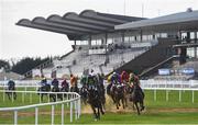 3 April 2021; Runners and riders race past the empty grandstand during the Boomerang.ie Maiden hurdle race on day one of the Fairyhouse Easter Festival at the Fairyhouse Racecourse in Ratoath, Meath. Photo by David Fitzgerald/Sportsfile
