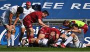 3 April 2021; Keith Earls of Munster, centre, is congratulated by team-mates after scoring his side's first try during the Heineken Champions Cup Round of 16 match between Munster and Toulouse at Thomond Park in Limerick. Photo by Ramsey Cardy/Sportsfile