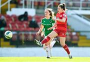 3 April 2021; Emily Whelan of Shelbourne has a shot on goal despite the efforts of Lauren Walsh of Cork City during the SSE Airtricity Women's National League match between Cork City and Shelbourne at Turners Cross in Cork. Photo by Eóin Noonan/Sportsfile