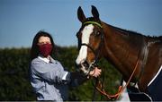 3 April 2021; Stablehand Gillian Brogan with Hearts Are Trumps after winning the RYBO Handicap hurdle on day one of the Fairyhouse Easter Festival at the Fairyhouse Racecourse in Ratoath, Meath. Photo by David Fitzgerald/Sportsfile