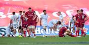 3 April 2021; Munster players including Fineen Wycherley, left, dejected after their side's defeat in the Heineken Champions Cup Round of 16 match between Munster and Toulouse at Thomond Park in Limerick. Photo by Ramsey Cardy/Sportsfile