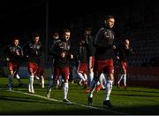 3 April 2021; Andy Lyons of Bohemians, right, warms-up alongside team-mates before the SSE Airtricity League Premier Division match between Bohemians and St Patrick's Athletic at Dalymount Park in Dublin. Photo by Seb Daly/Sportsfile