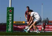 3 April 2021; Antoine Dupont of Toulouse scores his side's third try during the Heineken Champions Cup Round of 16 match between Munster and Toulouse at Thomond Park in Limerick. Photo by Ramsey Cardy/Sportsfile