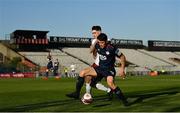 3 April 2021; Sam Bone of St Patrick's Athletic in action against Dawson Devoy of Bohemians during the SSE Airtricity League Premier Division match between Bohemians and St Patrick's Athletic at Dalymount Park in Dublin. Photo by Seb Daly/Sportsfile