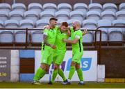 3 April 2021; Karl O’Sullivan, centre, celebrates with his Finn Harps team-mates Adam Foley, left, and Mark Coyle, after scoring his side's first goal during the SSE Airtricity League Premier Division match between Drogheda United and Finn Harps at Head in the Game Park in Drogheda, Louth. Photo by Ben McShane/Sportsfile