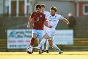 3 April 2021; Darren Murphy of Cobh is tackled by Paul Doyle of UCD during the SSE Airtricity League First Division match between Cobh Ramblers and UCD at St Colman's Park in Cobh, Cork. Photo by Eóin Noonan/Sportsfile