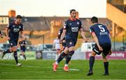 3 April 2021; Ronan Coughlan of St Patrick's Athletic, centre, celebrates with team-mate Lee Desmond, right, after scoring his side's first goal during the SSE Airtricity League Premier Division match between Bohemians and St Patrick's Athletic at Dalymount Park in Dublin. Photo by Seb Daly/Sportsfile