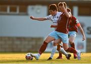 3 April 2021; Colm Whelan of UCD is tackled by Ian Turner of Cobh during the SSE Airtricity League First Division match between Cobh Ramblers and UCD at St Colman's Park in Cobh, Cork. Photo by Eóin Noonan/Sportsfile