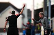 3 April 2021; Finn Harps manager Ollie Horgan remonstrates with referee Adriano Reale as he is given a yellow card during the SSE Airtricity League Premier Division match between Drogheda United and Finn Harps at Head in the Game Park in Drogheda, Louth. Photo by Ben McShane/Sportsfile