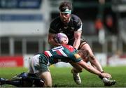 3 April 2021; Tom Daly of Connacht is tackled by Johnny McPhillips of Leicester Tigers during the European Rugby Challenge Cup Round of 16 match between Leicester Tigers and Connacht at Welford Road in Leicester, England. Photo by Matt Impey/Sportsfile