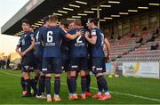 3 April 2021; Ronan Coughlan of St Patrick's Athletic, right, celebrates with team-mates after scoring his side's first goal during the SSE Airtricity League Premier Division match between Bohemians and St Patrick's Athletic at Dalymount Park in Dublin. Photo by Seb Daly/Sportsfile