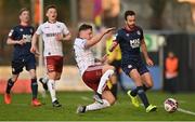 3 April 2021; Robbie Benson of St Patrick's Athletic in action against Rob Cornwall of Bohemians during the SSE Airtricity League Premier Division match between Bohemians and St Patrick's Athletic at Dalymount Park in Dublin. Photo by Seb Daly/Sportsfile