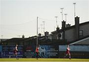 3 April 2021; Drogheda United players, from left, Dane Massey, goalkeeper David Odumosu and Hugh Douglas make their way out ahead of the SSE Airtricity League Premier Division match between Drogheda United and Finn Harps at Head in the Game Park in Drogheda, Louth. Photo by Ben McShane/Sportsfile