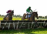 4 April 2021; Ashdale Bob, right, with Robbie Power up, jumps the last on their way to winning the Colm Quinn BMW Novice Hurdle, from second place Decimation, with Sean Flanagan up, on day two of the Fairyhouse Easter Festival at the Fairyhouse Racecourse in Ratoath, Meath. Photo by Seb Daly/Sportsfile