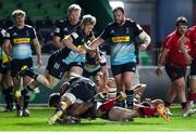 4 April 2021; Stuart McCloskey of Ulster scores his side's first try despite the tackles of Tyrone Green and Elia Elia of Harlequins during the European Rugby Challenge Cup Round of 16 match between Harlequins and Ulster at The Twickenham Stoop in London, England. Photo by Matt Impey/Sportsfile