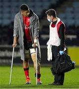 4 April 2021; Cormac Izuchukwu of Ulster leaves the pitch on crutches after the European Rugby Challenge Cup Round of 16 match between Harlequins and Ulster at The Twickenham Stoop in London, England. Photo by Matt Impey/Sportsfile