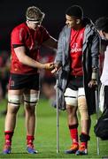 4 April 2021; Matty Rea of Ulster, left, with teammate Cormac Izuchukwu, on crutches, after the European Rugby Challenge Cup Round of 16 match between Harlequins and Ulster at The Twickenham Stoop in London, England. Photo by Matt Impey/Sportsfile